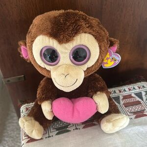 The Casanova Valentine Monkey is retired, with mint tags, approx. 9-10”